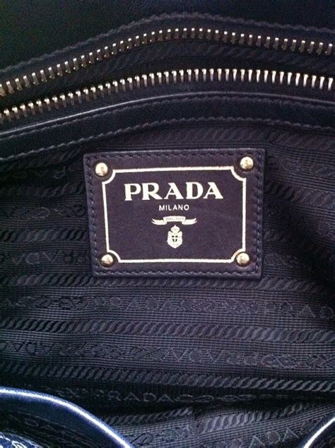 prada bag serial number 165|are prada bags genuine.